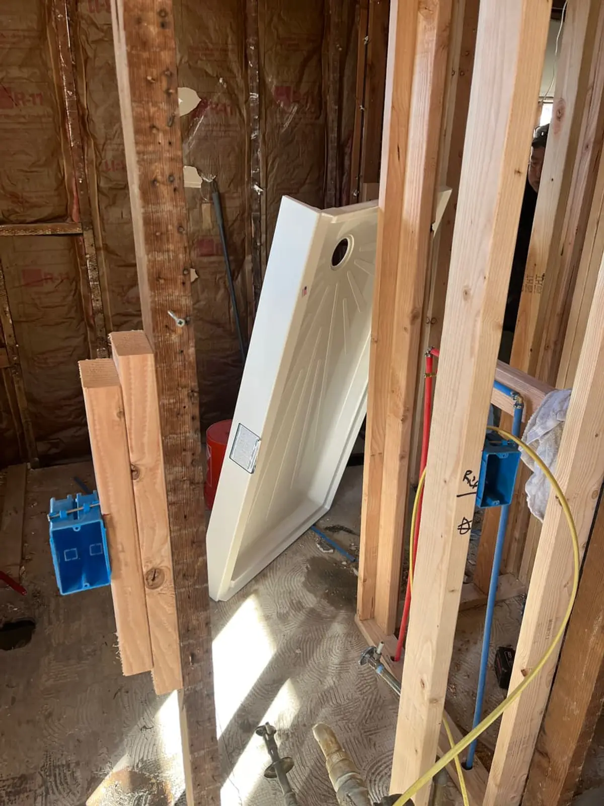 Selling a house with unpermitted work in Lindenhurst: bathroom framed out with a new tub going in
